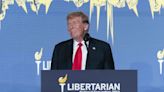 Donald Trump confronts repeated booing during Libertarian convention speech