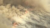 Huge bushfire sweeps through central Australia near popular tourist town