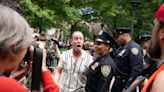 Protesters face off outside courthouse as Trump awaits hush money trial verdict