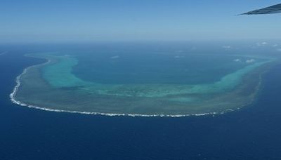 Philippines condemns China’s ‘illegal and reckless’ actions for dropping flares in the skies above South China Sea | CNN