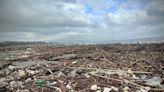 Fotos muestran toneladas de basura en desembocadura del río Maipo arrastradas desde Santiago por lluvias - La Tercera