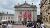 Pro-Palestinian protesters spray red paint on Cambridge graduation building