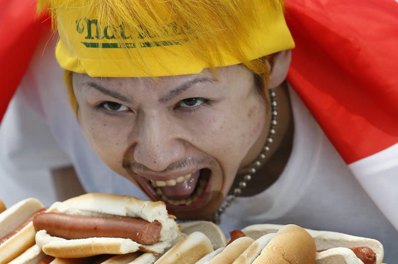 Competitive eater Kobayashi says health, lack of hunger caused retirement
