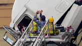 Christmas miracle: Video, photos show rescue as truck dangles over Florida Turnpike