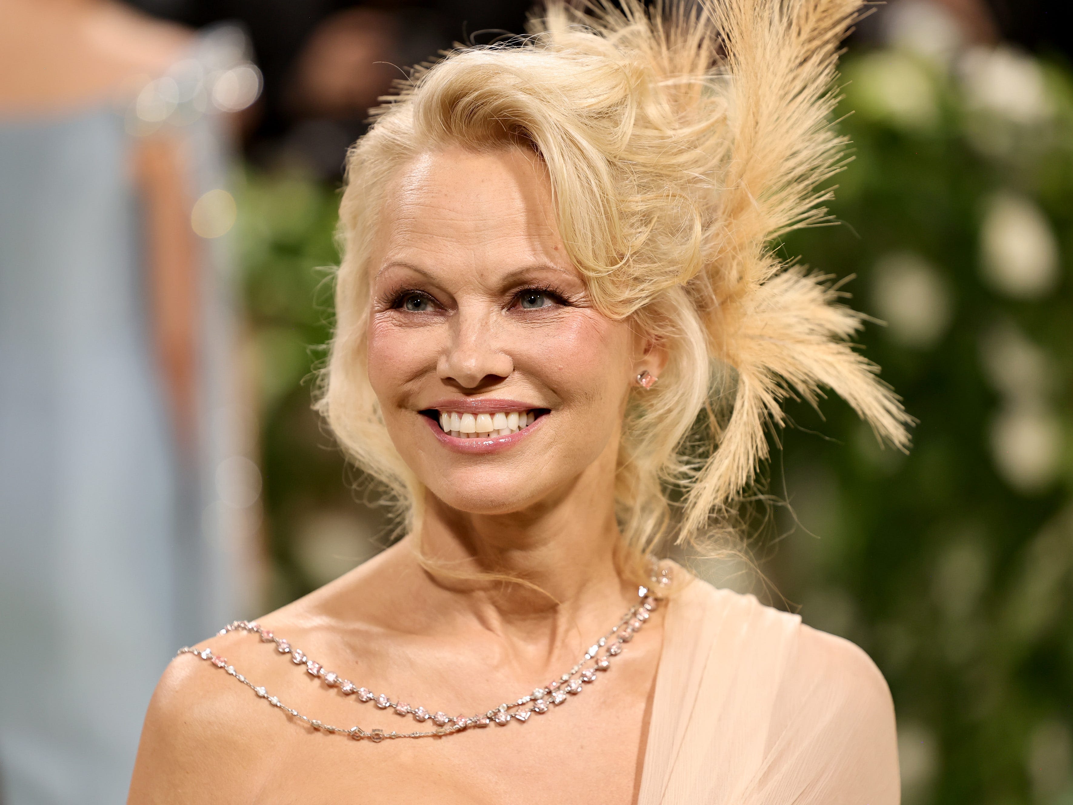 Pamela Anderson broke her makeup-free streak for her first Met Gala