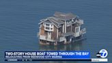 Watch: Two-story house floats through San Francisco Bay