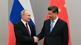 Factbox-Putin, quoting Confucius, heaps praise on Xi