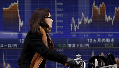 Asian stocks sluggish before more rate cues; Chinese markets gain