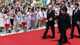 Rare pictures inside North Korea show streets decked out with Putin posters