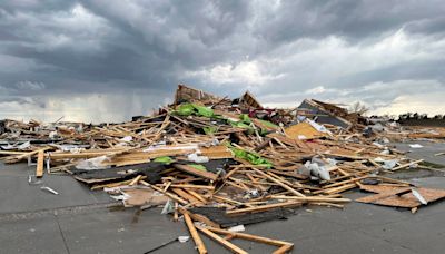 Tornadoes collapse buildings and level homes in Nebraska and Iowa