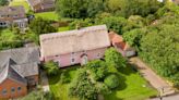 Idyllic pink thatched cottage for sale in Suffolk