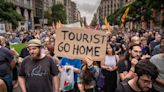 'Pathetic' Spanish protesters target tourists in ugly 'shame' campaign