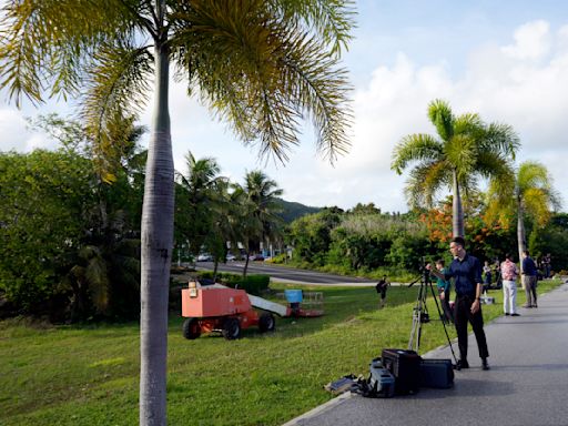 Saipan, placid island setting for Assange's last battle, is briefly mobbed — and bemused by the fuss