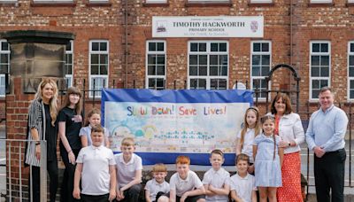 County Durham children design road safety banner for drivers at primary school