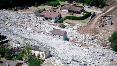 Three missing after huge landslide crashes down on Swiss Alps village