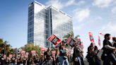 Hundreds of hotel, service workers rally in downtown San Diego for $25-an-hour minimum wage