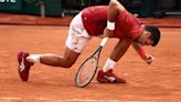 Djokovic shrugs off injury, tops Cerundolo in another French Open epic