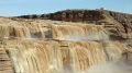 ‘Chocolate waterfall' roars to life after summer storms