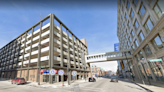 A downtown parking ramp for Fiserv's future headquarters has been sold. It's getting a makeover.