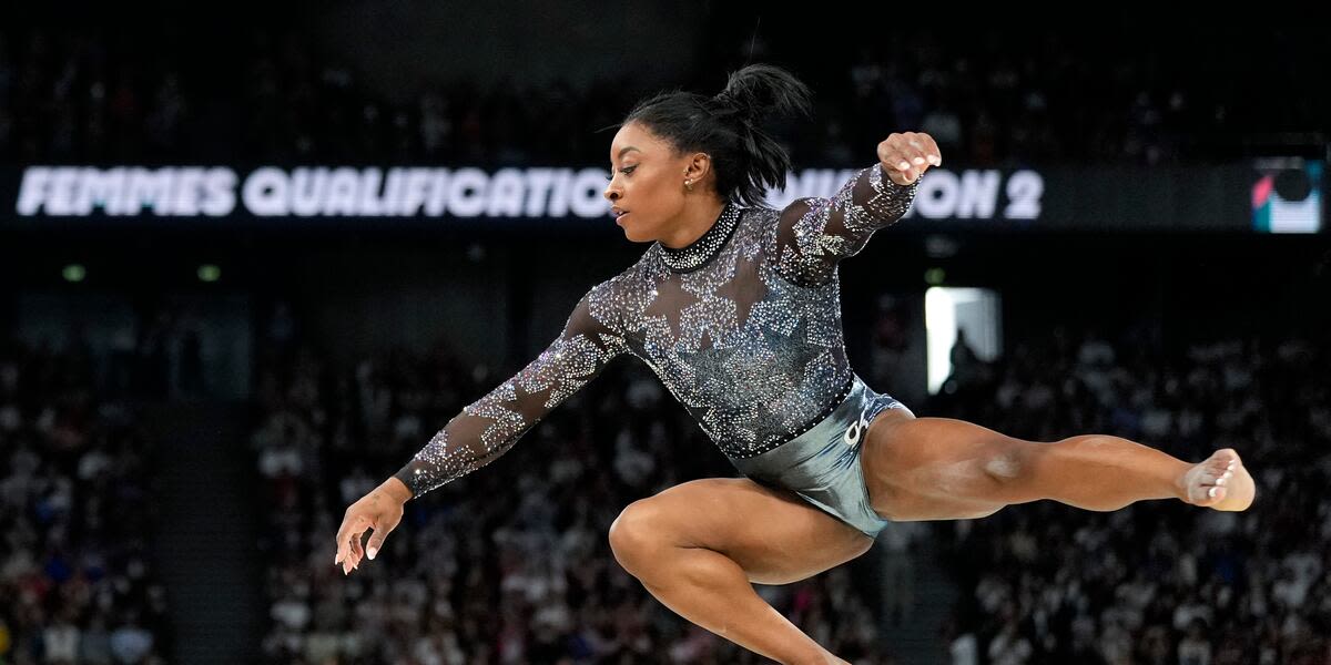 Simone Biles starts her 3rd Olympics on balance beam in front of a star-studded crowd