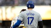 Shohei Ohtani leaves late in Dodgers’ win over Padres with back tightness