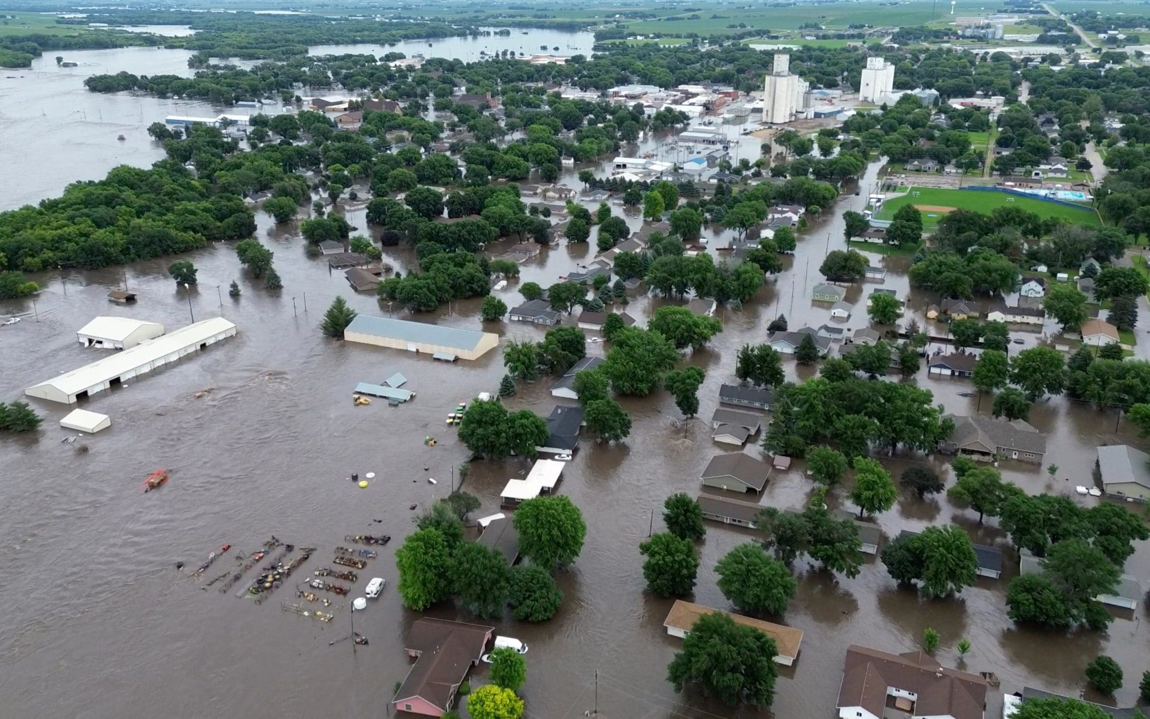 Flooding forces people from homes while much of US broils