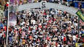 Crowds endure heat for Calgary Stampede family day festivities