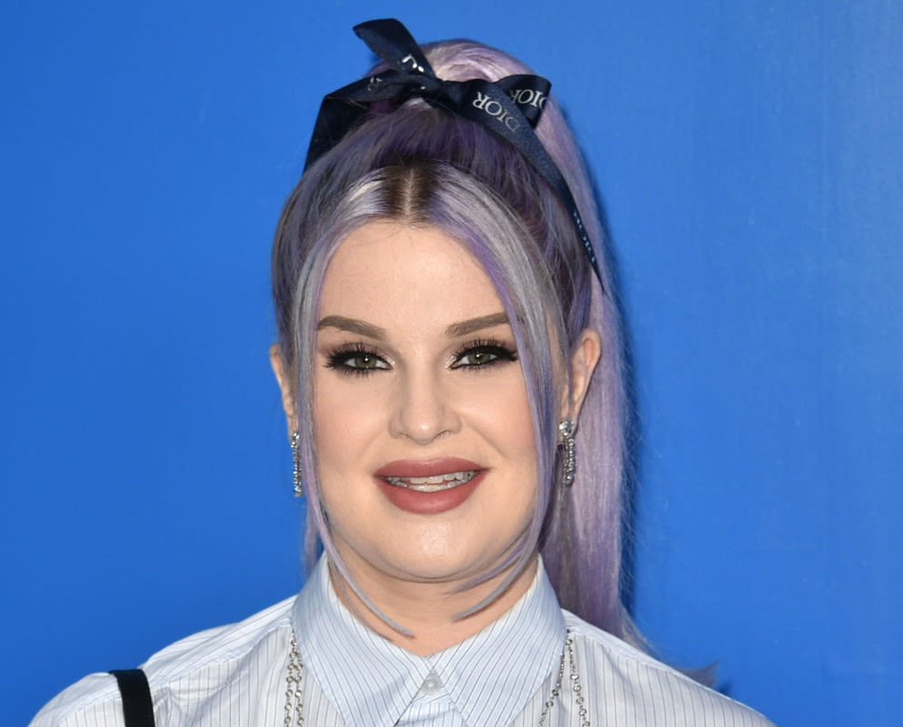 Kelly Osbourne Rocks Lime Green Silk Dress While Out and About With Partner Sid Wilson and Son Sidney