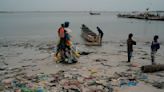 AP PHOTOS: 'Plastic Man' in Senegal on mission against trash