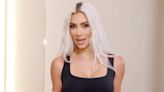 Kim shows off her chiseled abs in just a 'naked' bra after drastic weight loss