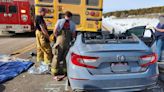 Driver dies after colliding with stopped school bus