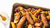 Roast Italian sausages over potatoes and peppers for a flavorful one-pan supper