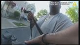 Police bodycam video shows altercation, pursuit of man accused of stealing cruiser