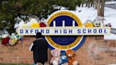 After convictions of Michigan school shooter's parents, victims' families seek school accountability