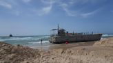 Rough seas damage US-built Gaza pier, temporarily halting aid deliveries