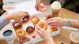 Krispy Kreme is giving away free dozens of doughnuts. Here’s how to get one