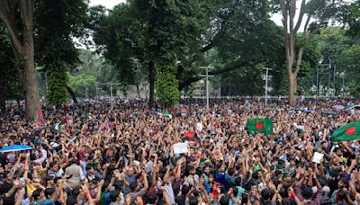 Latest violence in Bangladesh leaves at least 20 dead as rival protesters march