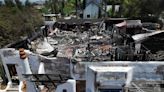 Photos show charred remnants of Riverside neighborhood after firework sparks massive wildfire in California