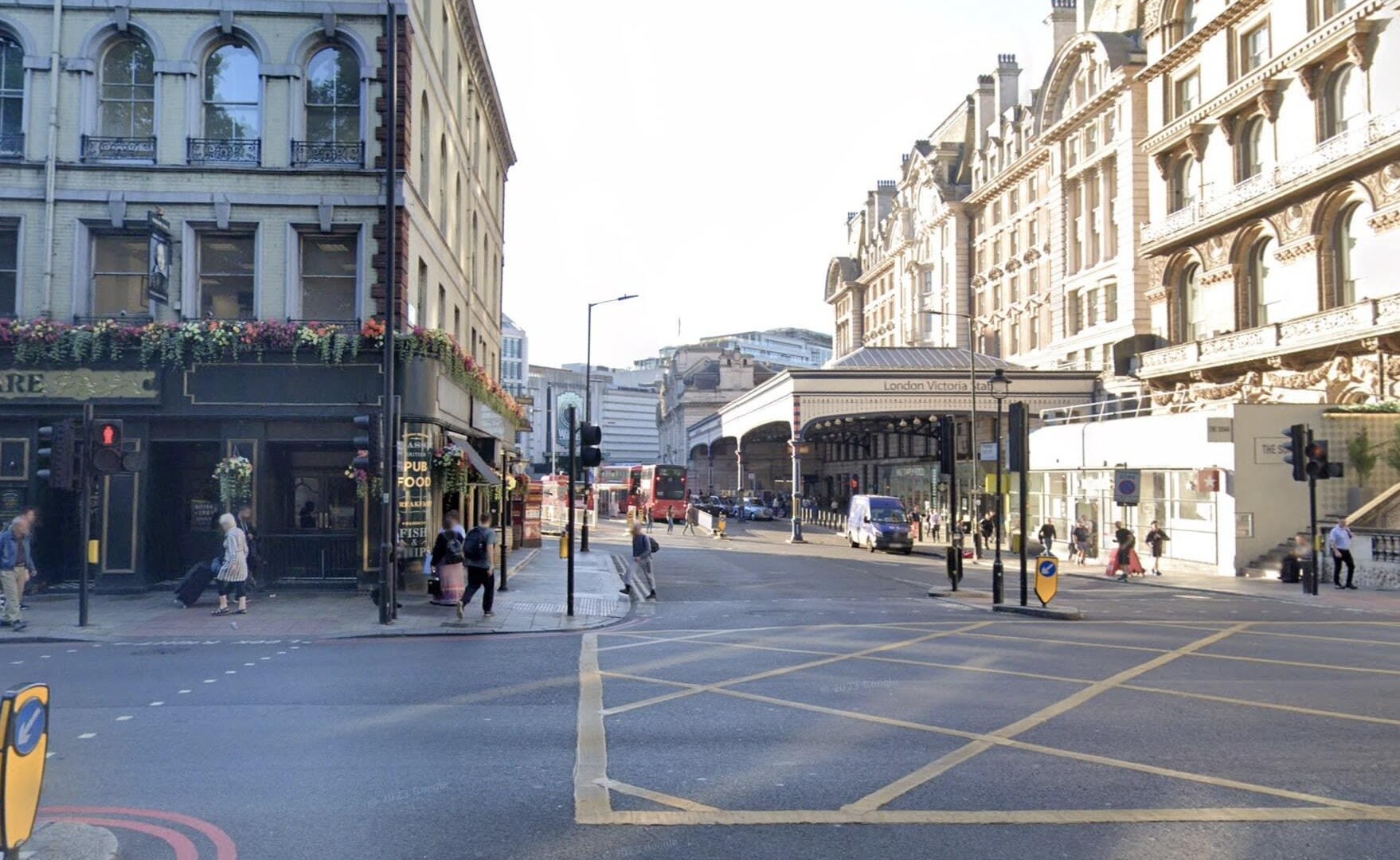 Woman fighting for her life after being hit by double-decker bus outside station