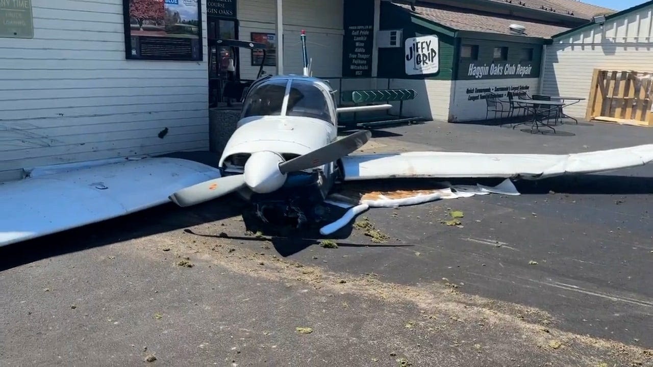 Video shows plane crash on busy California golf course, slide across green into pro shop