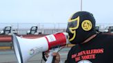 A Mexican masked man fights for immigrant worker rights, in the streets and on the radio