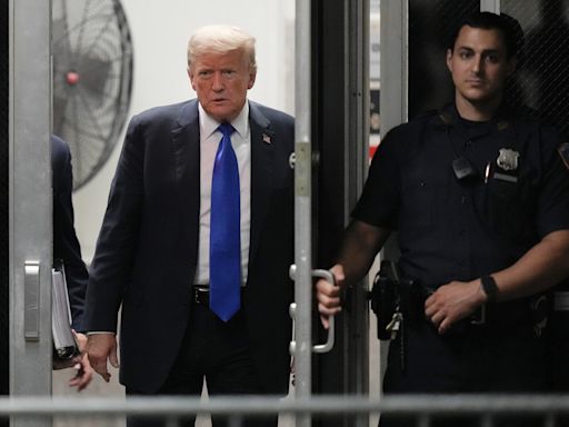 Americans are split over whether Trump should face prison in the hush money case, AP-NORC poll finds