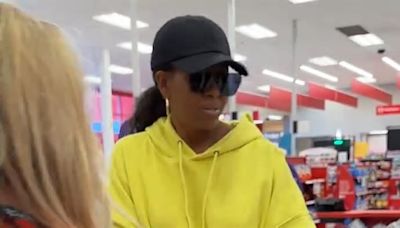 Michelle Obama goes undercover at Target in baseball cap and dark glasses as former first lady reveals secret shopping mission