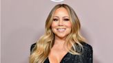 Mariah Carey Dives Into the Ocean in a Hot-Pink Wet Suit to Celebrate Her 54th Birthday