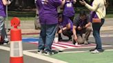 Labor groups paint street in unpermitted protest at California State Capitol on May Day