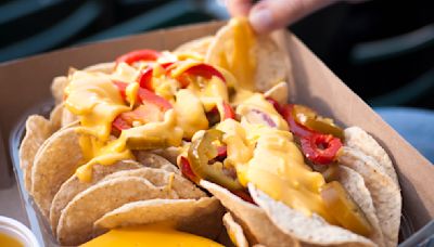 This Pickled Ingredient Is The Key To Stadium-Style Nacho Cheese Sauce