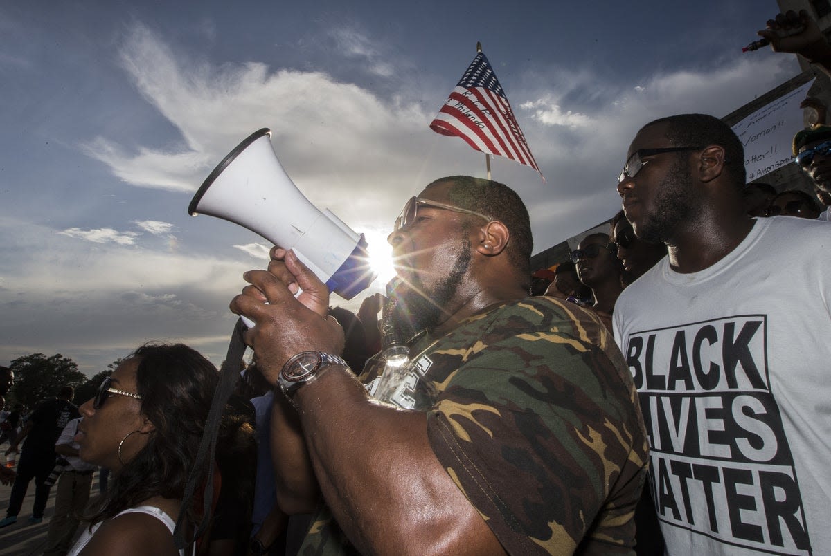 A dozen Louisiana victims of police racism get $1,000 each month. The program is funded by a family that got rich off slavery