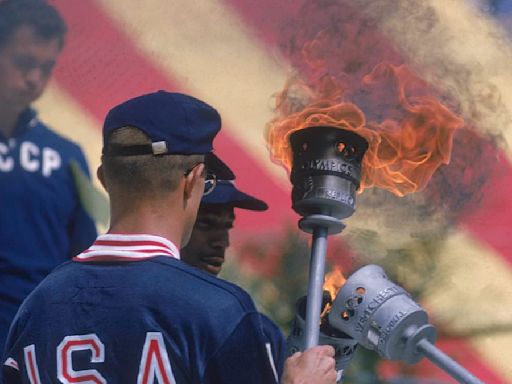 You can now by the torch that lit the 1960 Olympics at auction