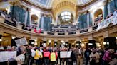 'Here again': Abortion activists rally 50 years after Roe