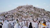 Muslim pilgrims converge at Mount Arafat for daylong worship as Hajj reaches its peak